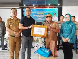 Kepala Desa Sukadana Hasim Terima Penghargaan Dalam Pelunasan PBB Tercepat